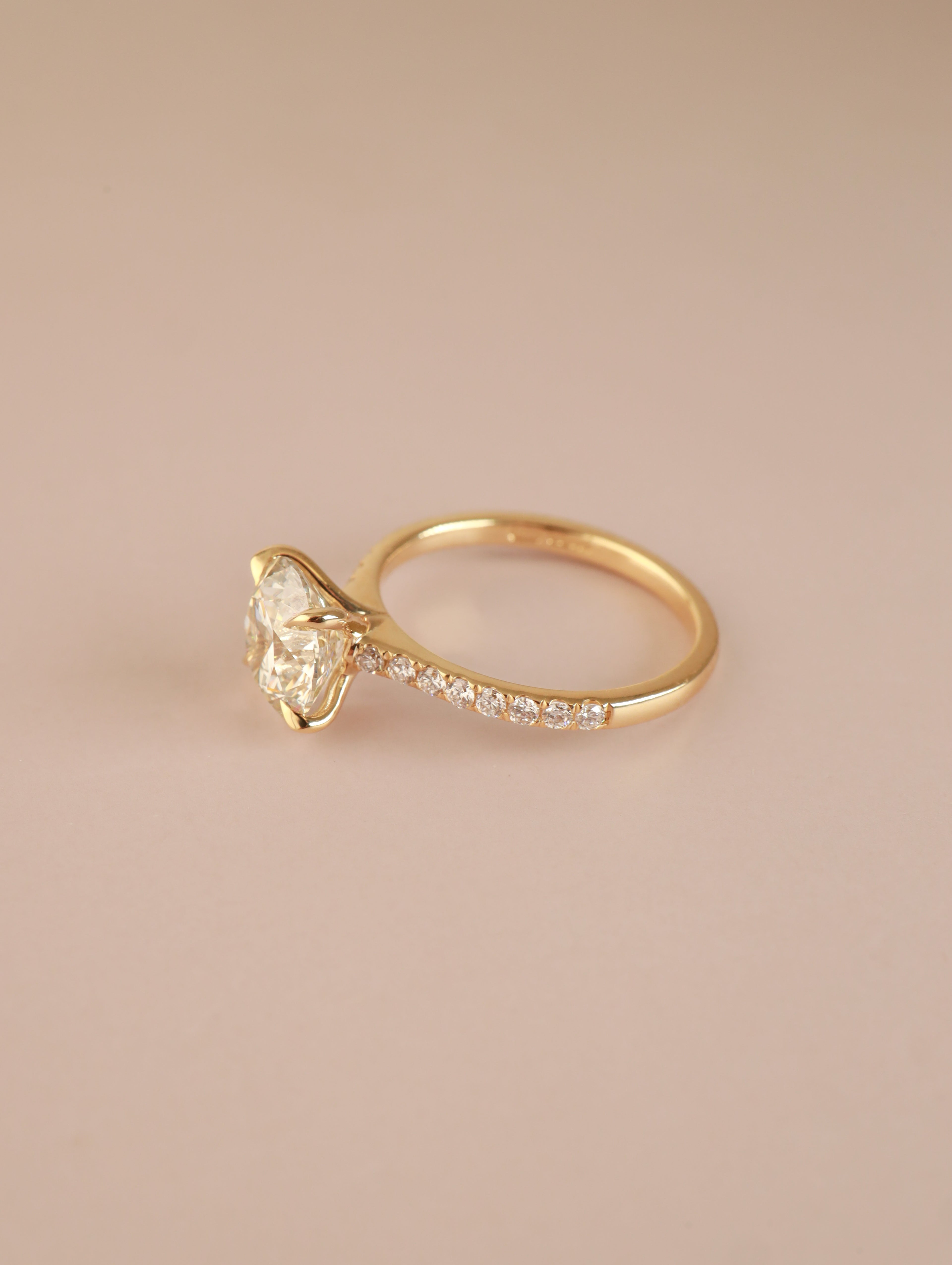 Round shape Lab Grown diamond Engagement ring with microset shoulders in yellow gold