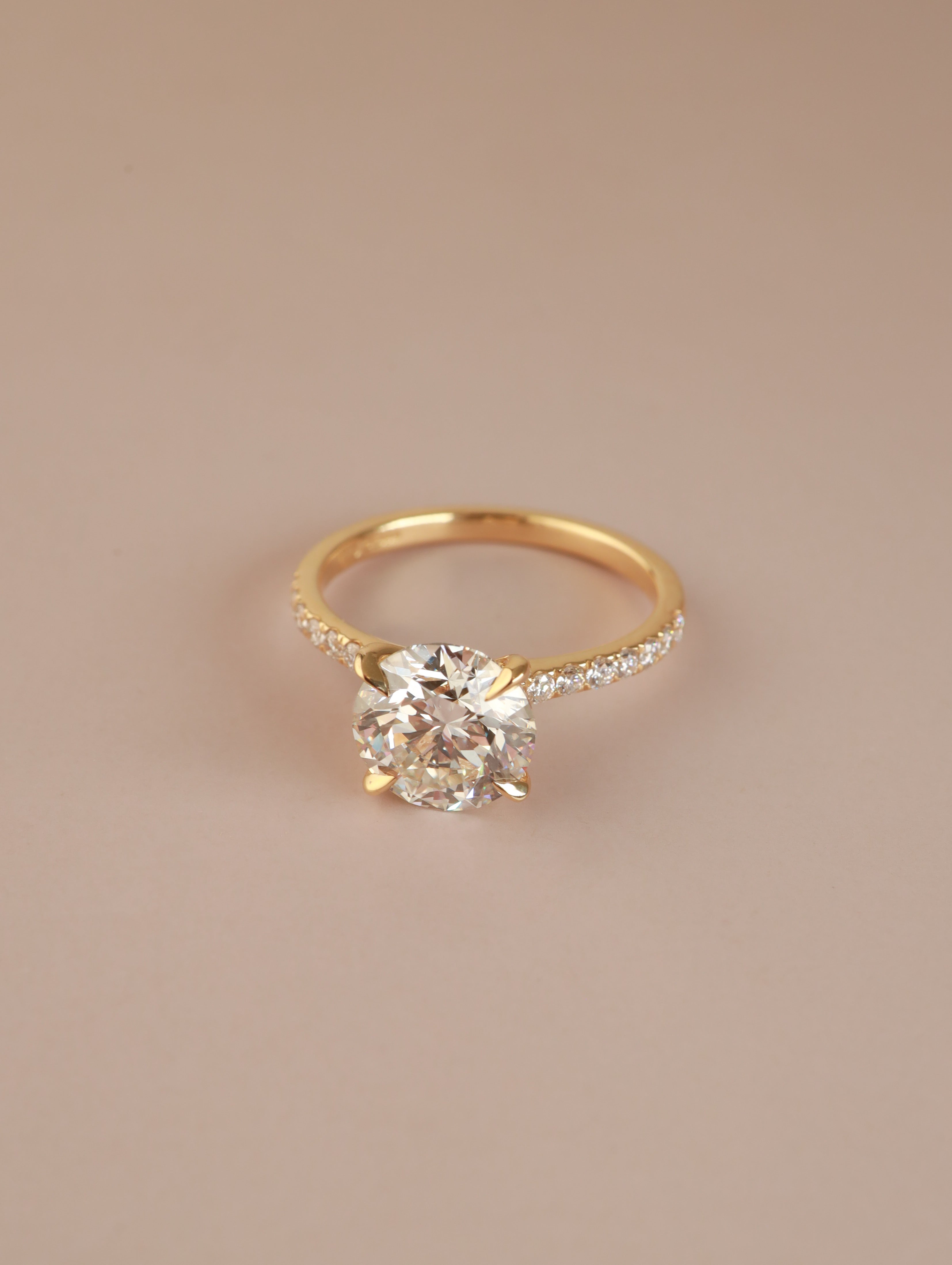 Round shape Lab Grown diamond Engagement ring with microset shoulders in yellow gold