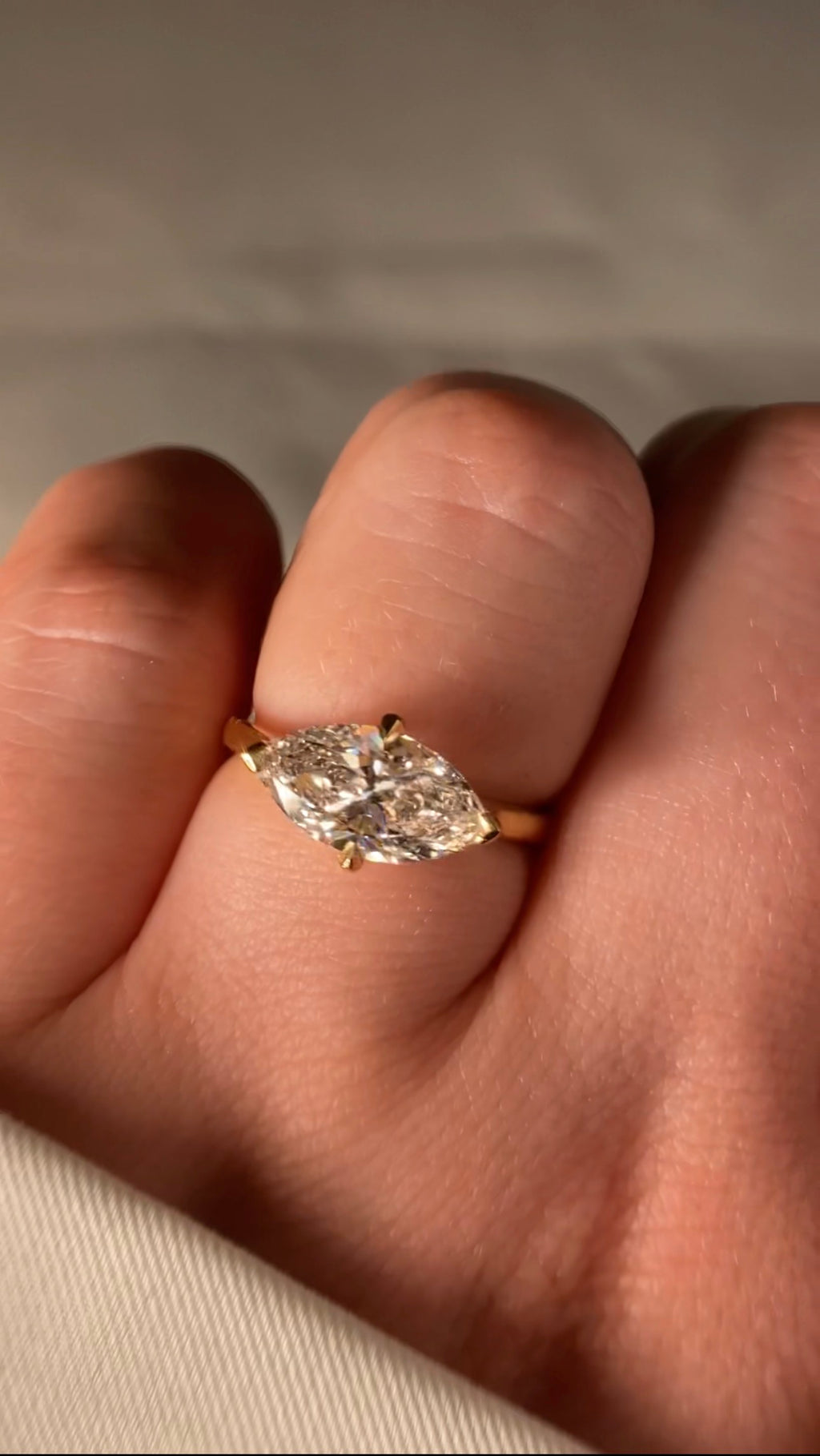 East-West Marquise Solitaire Engagement Ring