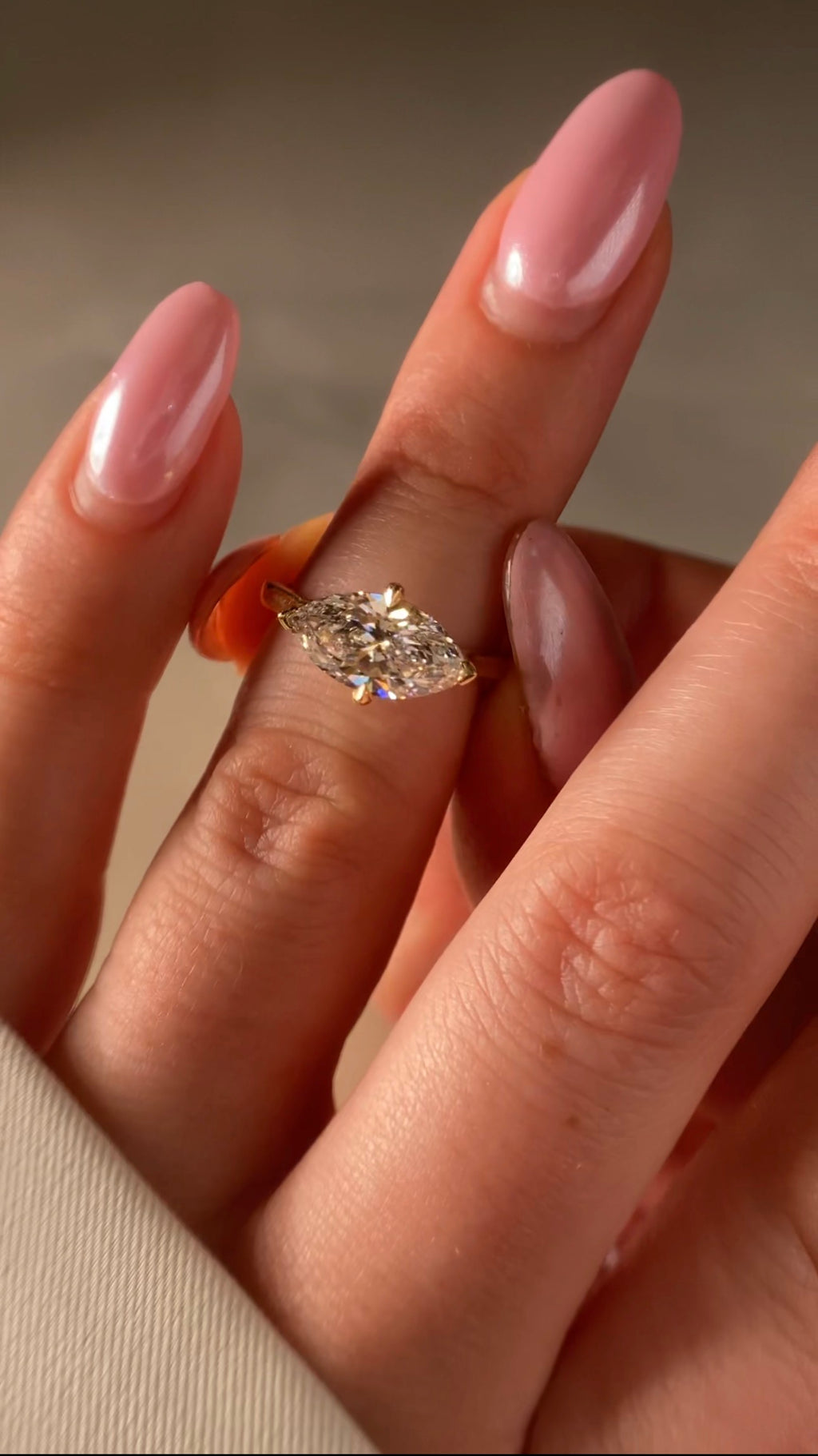 East-West Marquise Solitaire Engagement Ring